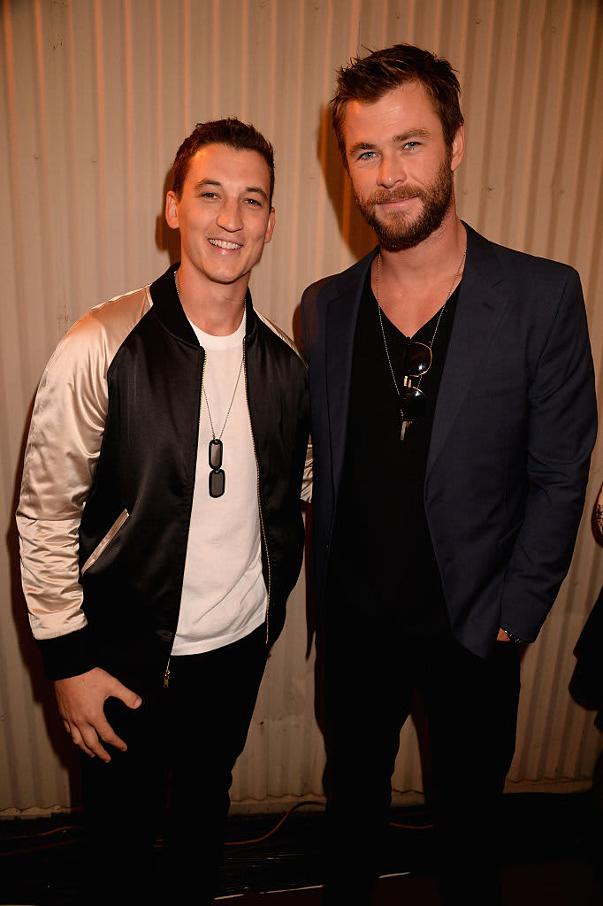 BURBANK, CALIFORNIA - APRIL 09:  (EXCLUSIVE ACCESS, SPECIAL RATES APPLY) Actors Miles Teller (L) and Chris Hemsworth attend the 2016 MTV Movie Awards at Warner Bros. Studios on April 9, 2016 in Burbank, California.  MTV Movie Awards airs April 10, 2016 at 8pm ET/PT.  (Photo by Jeff Kravitz/FilmMagic for MTV)