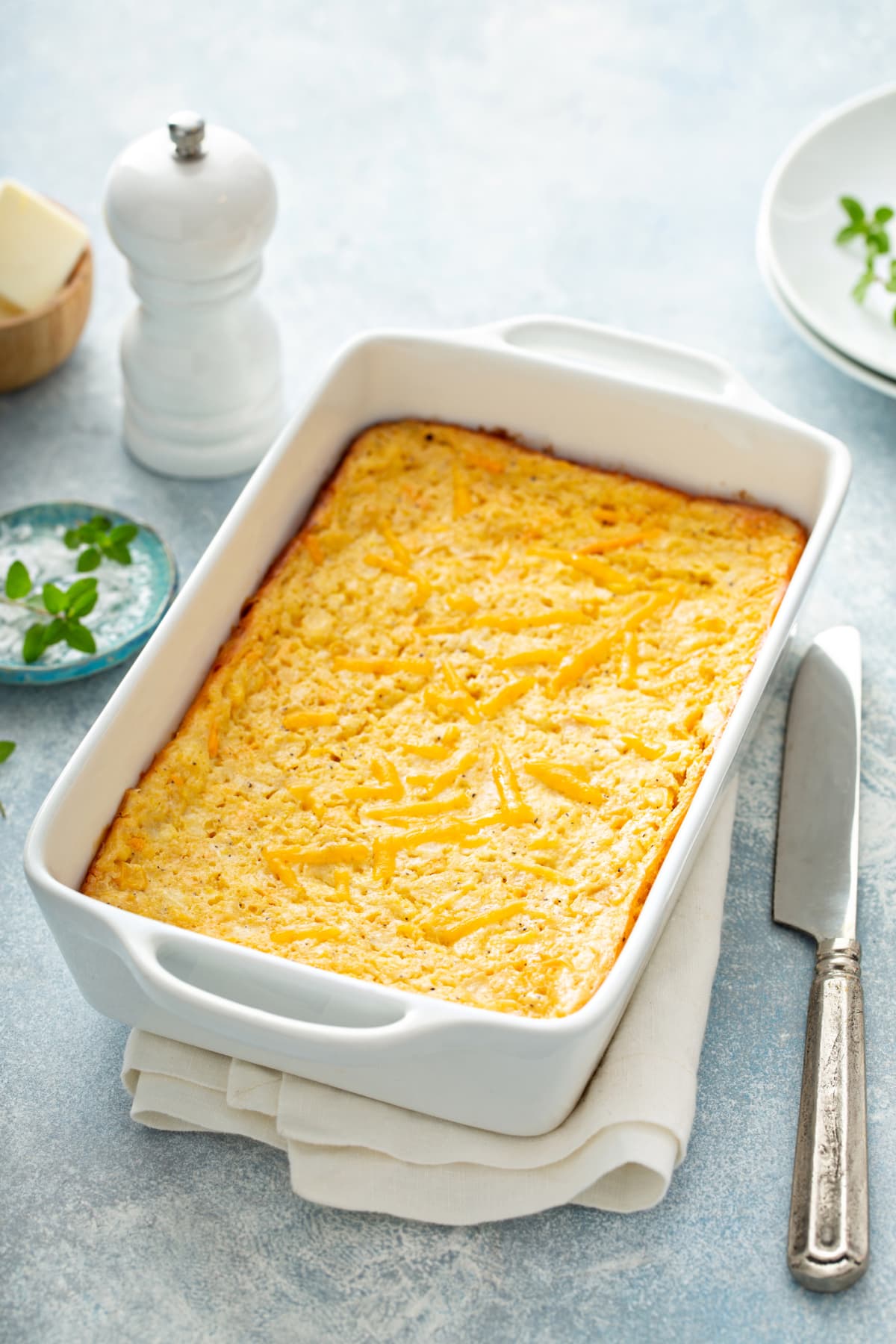 Cheesy cornbread freshly baked in a pan, southern food