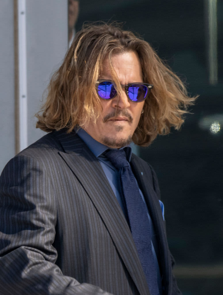FAIRFAX, VA - APRIL 14: (NY & NJ NEWSPAPERS OUT) Johnny Depp arrives outside court during the Johnny Depp and Amber Heard civil trial at Fairfax County Circuit Court on April 14, 2022 in Fairfax, Virginia. Depp is seeking $50 million in alleged damages to his career over an op-ed Heard wrote in the Washington Post in 2018.(Photo by Ron Sachs/Consolidated News Pictures/Getty Images)