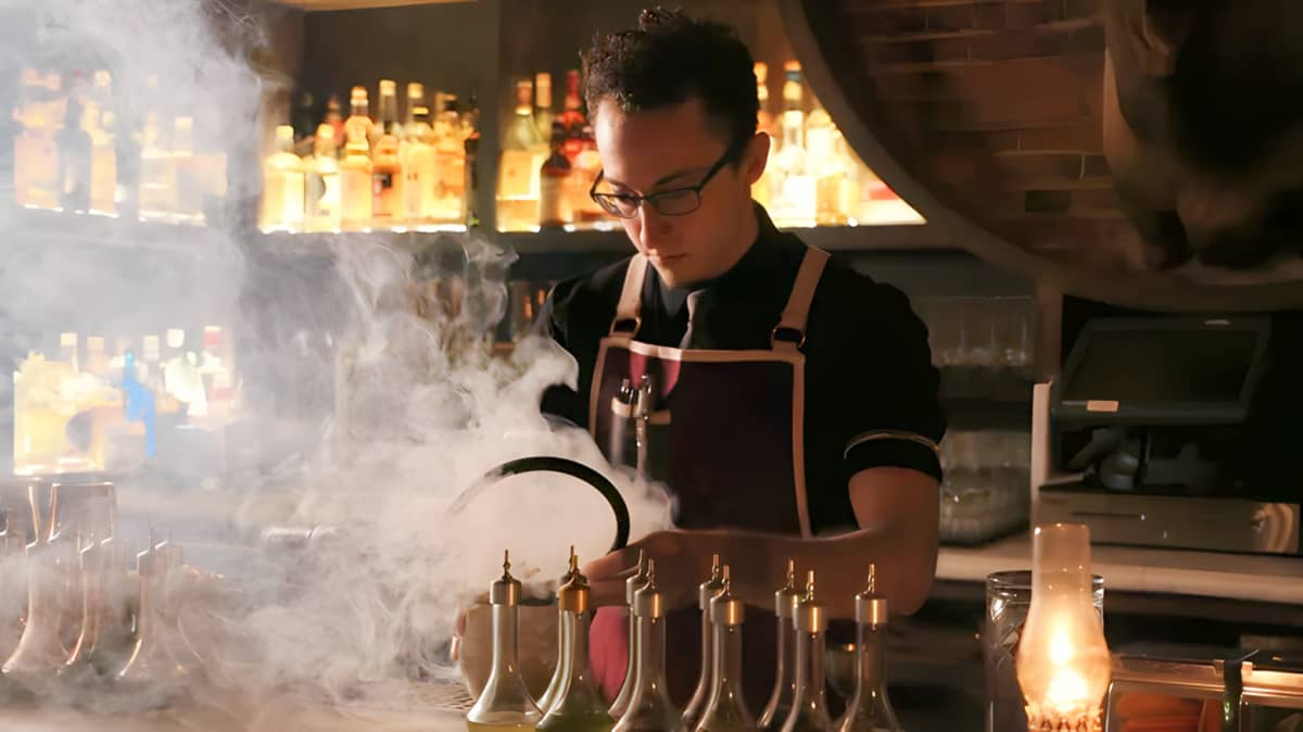 A bartender working at The Elk Room