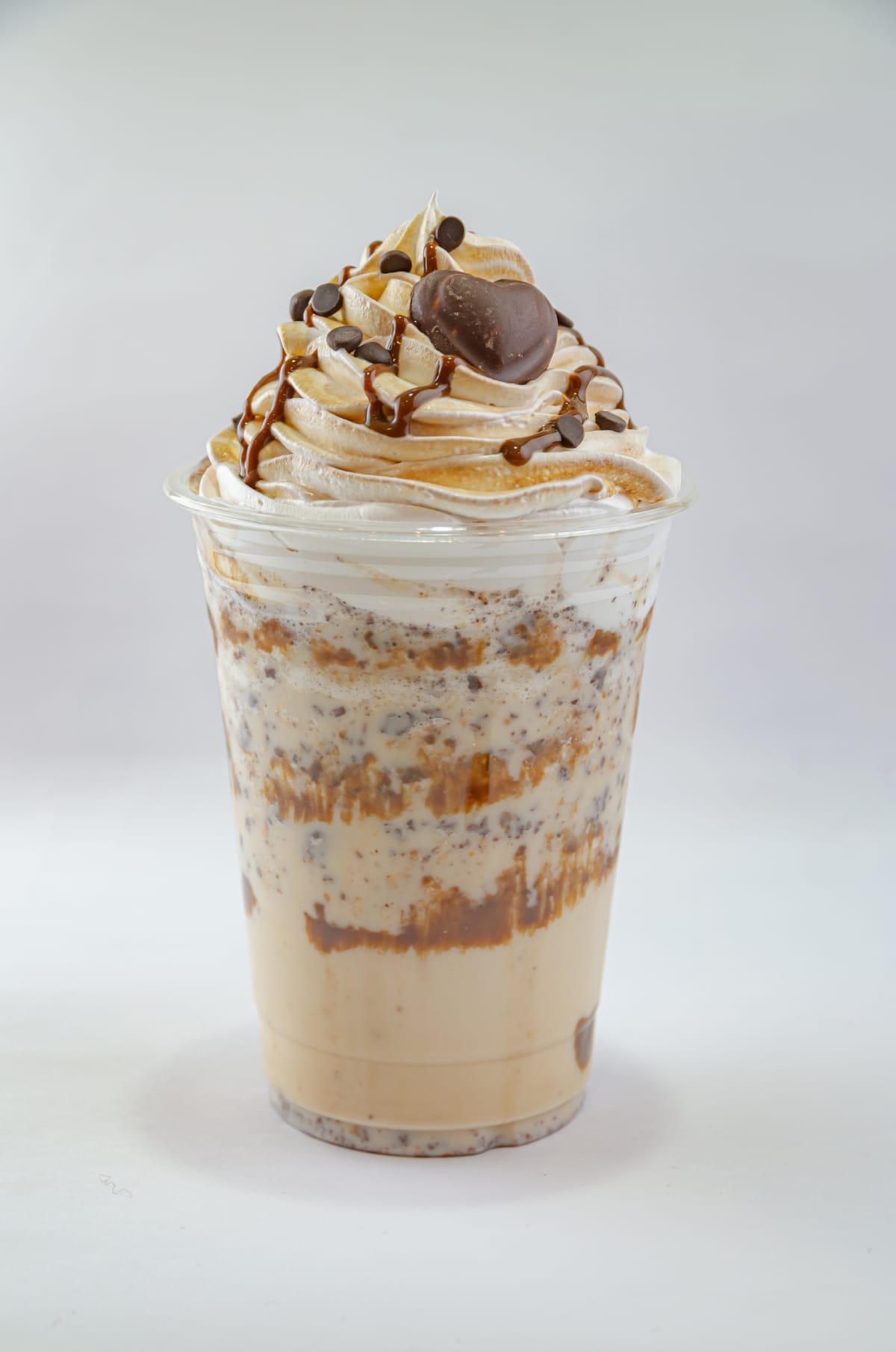 Coffee frappe drink with whipped cream and chocolate