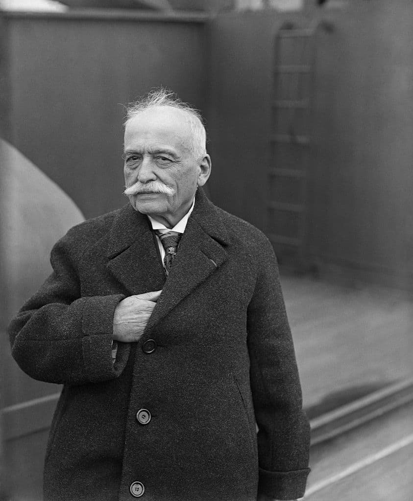 (Original Caption) Auguste Escoffier, French chef at various first class hotels, is shown standing on a ship as it arrives in New York.