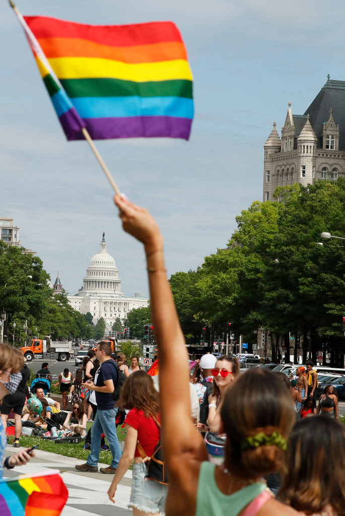 WASHINGTON, DC - JUNE 12: People gather to dance and celebrate Pride 2021 at a rally in Freedom Plaza on June 12, 2021 in Washington, DC. Pride Month, hosted by the Capital Pride Alliance, celebrates the LGBTQ community in Washington, DC. (Photo by Paul Morigi/Getty Images)