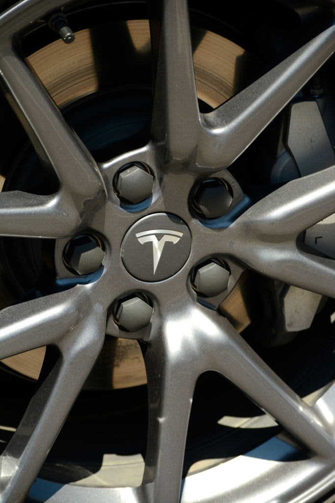 CRATER LAKE NATIONAL PARK, OREGON - JUNE 13, 2019: A wheel rim with logo on a Tesla electric car parked at a Tesla battery charging station in Crater Lake National Park in Oregon. (Photo by Robert Alexander/Getty Images)