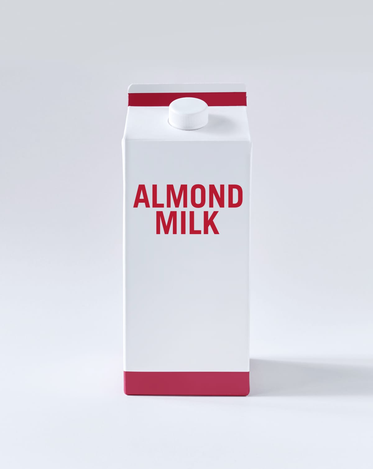 Almond milk carton on white background