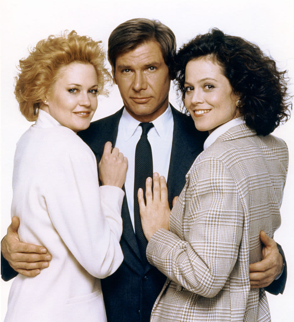 American actors Melanie Griffith, Harrison Ford and Sigourney Weaver on the set of Working girl directed by German-born American Mike Nichols. (Photo by Sunset Boulevard/Corbis via Getty Images)