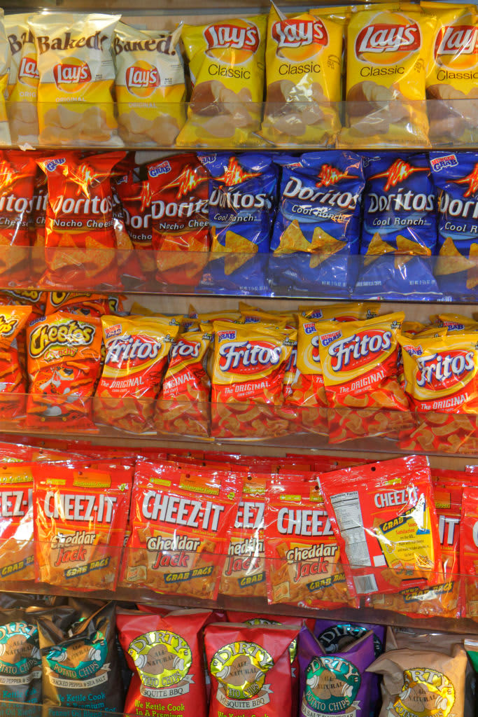 Plastic bagged snacks on a store shelf