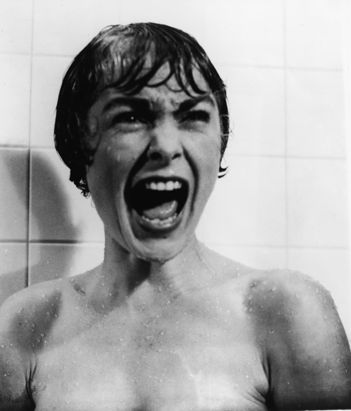 American actor Janet Leigh screams in the shower in the famous scene from the film, 'Psycho,' directed by Alfred Hitchcock, 1960. (Photo by Paramount Pictures/Courtesy of Getty Images) 