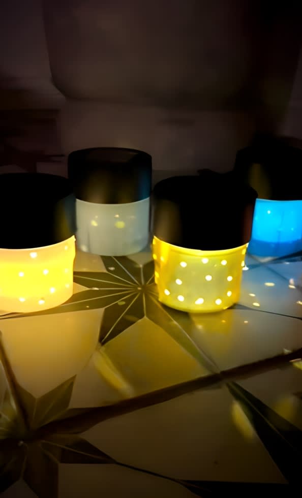 Solar lanterns made from spray paint can lids