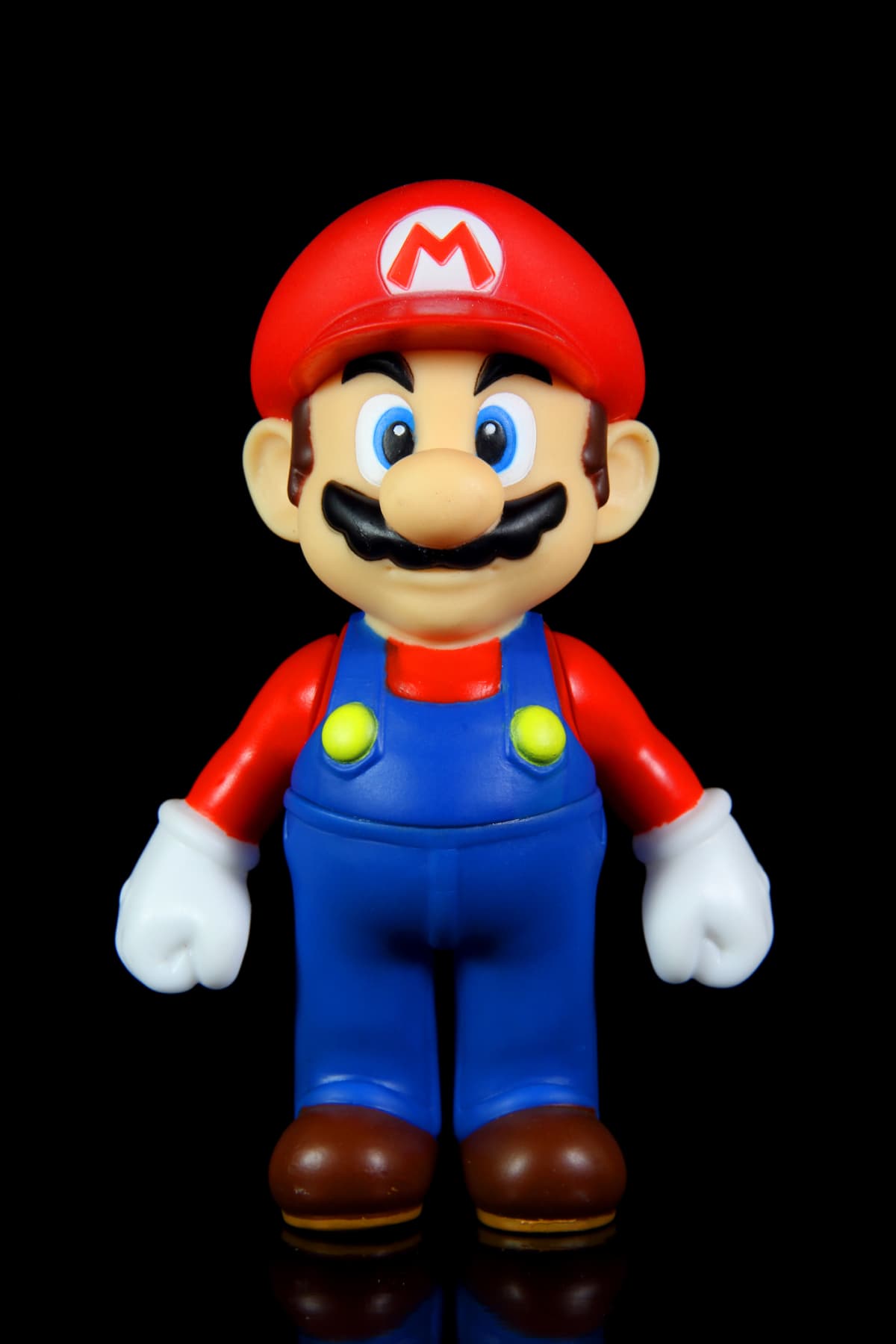 Mario from the Nintendo Super Mario franchise against a black background