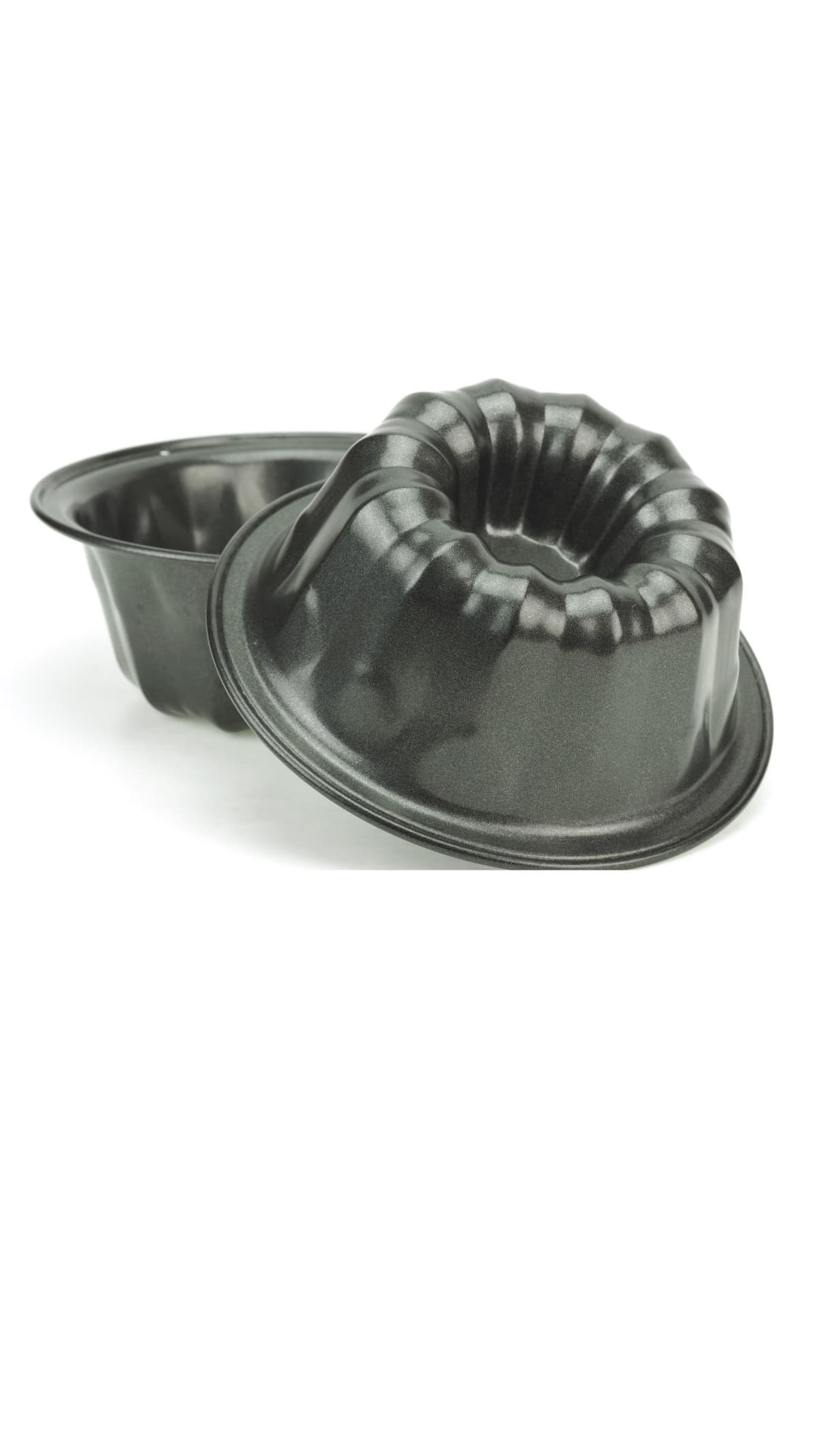 Two black Bundt cake pans against a white background