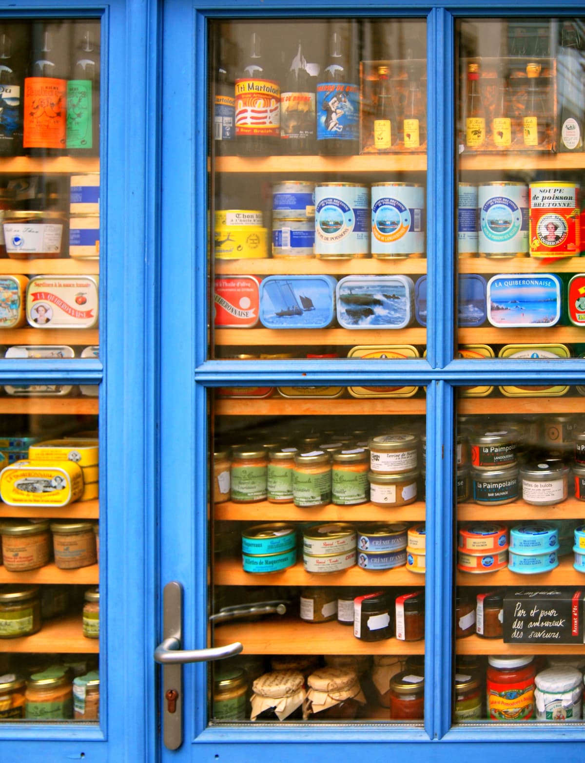 a pantry full of canned items 