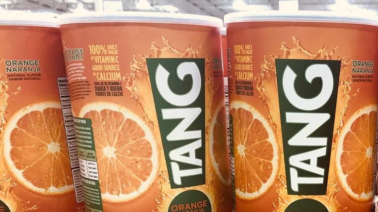 Containers of Tang displayed on a grocery store shelf