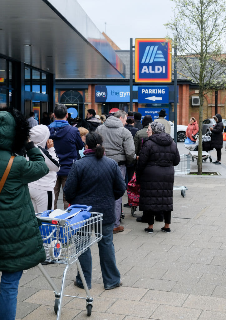 LONDON, UNITED KINGDOM - MARCH 15, 2020 - Coronavirus: a long queue of people waiting to go into Aldi store on Tottenham High Road as people stock up because of the coronavirus- PHOTOGRAPH BY Matthew Chattle / Future Publishing (Photo credit should read Matthew Chattle/Future Publishing via Getty Images)