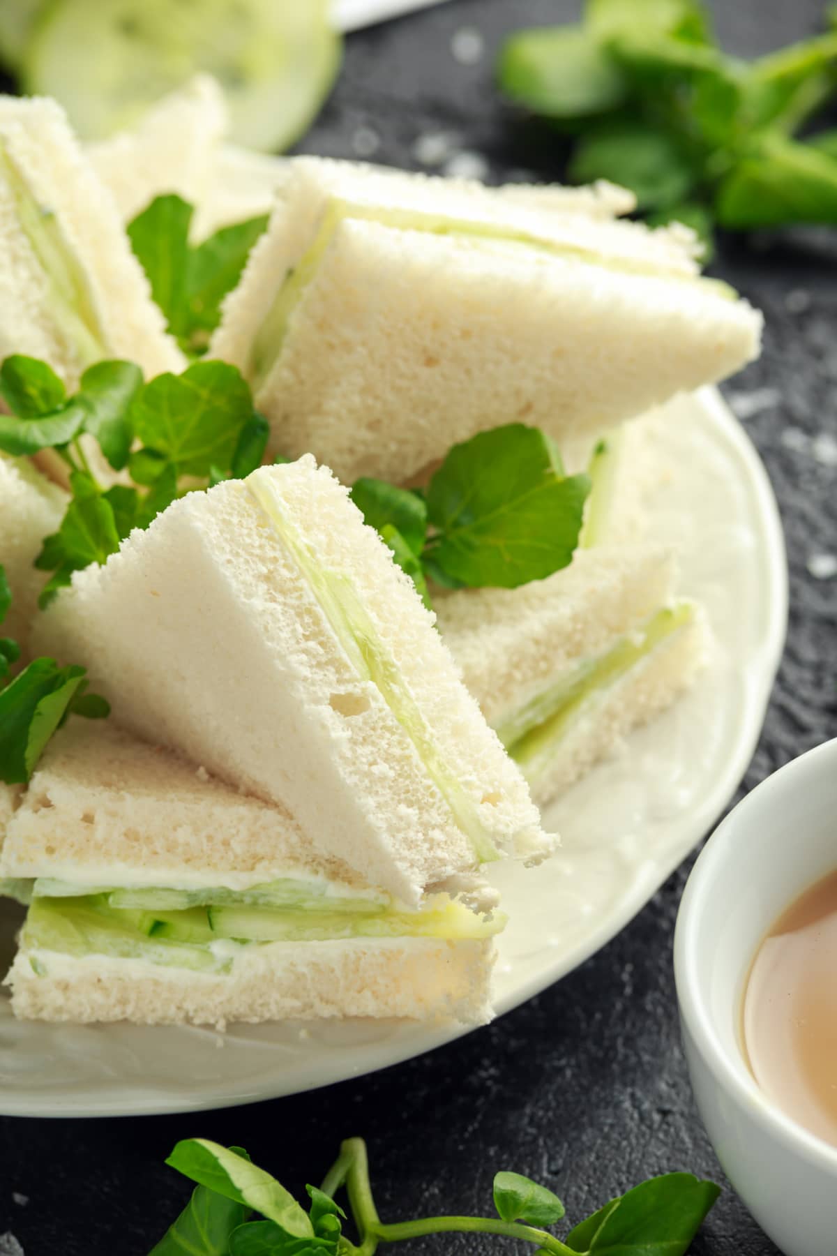 Cucumber sandwiches with soft cheese, sea salt and water cress for tea party.