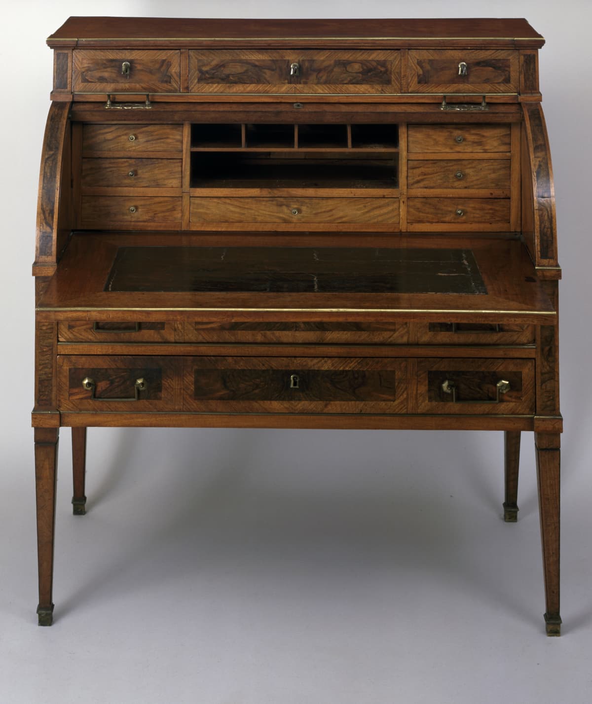 FRANCE - DECEMBER 02:  Louis XVI style spruce roll-top writing desk with walnut veneer finish, open. France, 18th century. (Photo by DeAgostini/Getty Images)
