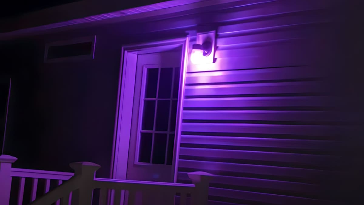 House with a purple porch light