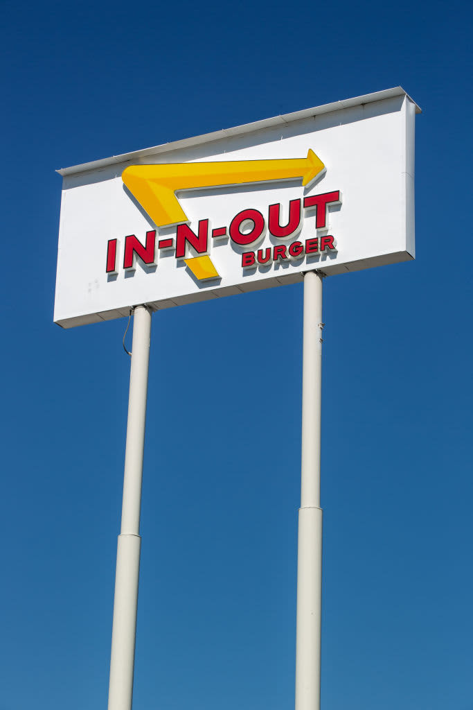 In-N-Out burger sign against blue sky
