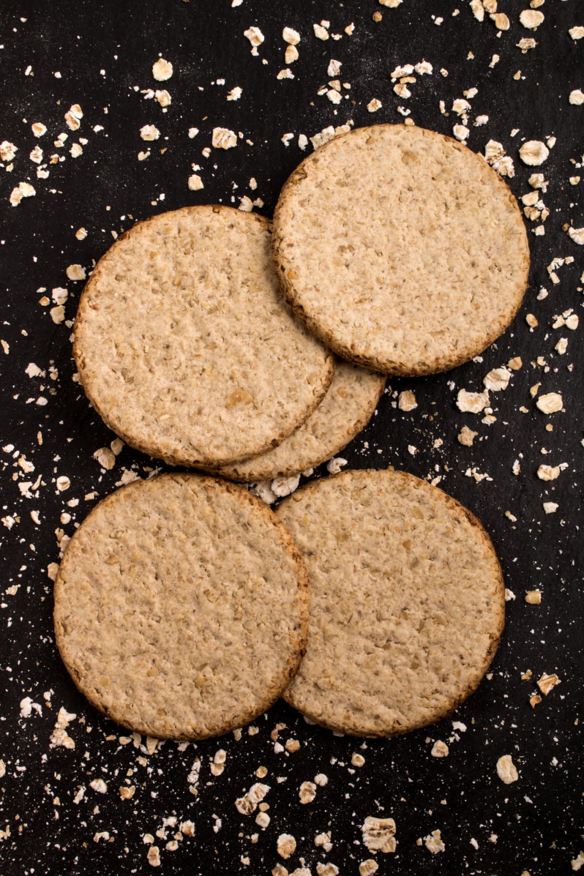 Shallow depth of feild image of Oat Cakes on an commercial baking tray, just after leaving the overn No.3