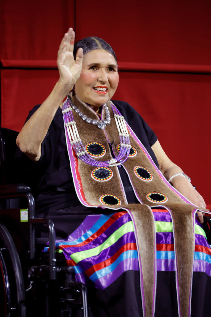 Sacheen Littlefeather, a model and actress who is part Apace, appeared at the Academy Awards in place of Oscar winner Marlon Brando because Brando would not accept his award for Godfather.