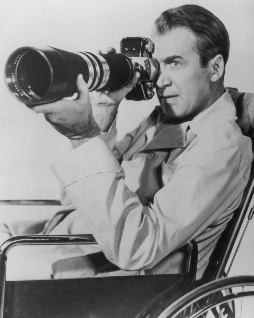 Director Alfred Hitchcock appears on a poster for his movie 'Rear Window', which stars James Stewart as a housebound voyeur, 1954.  (Photo by Movie Poster Image Art/Getty Images)