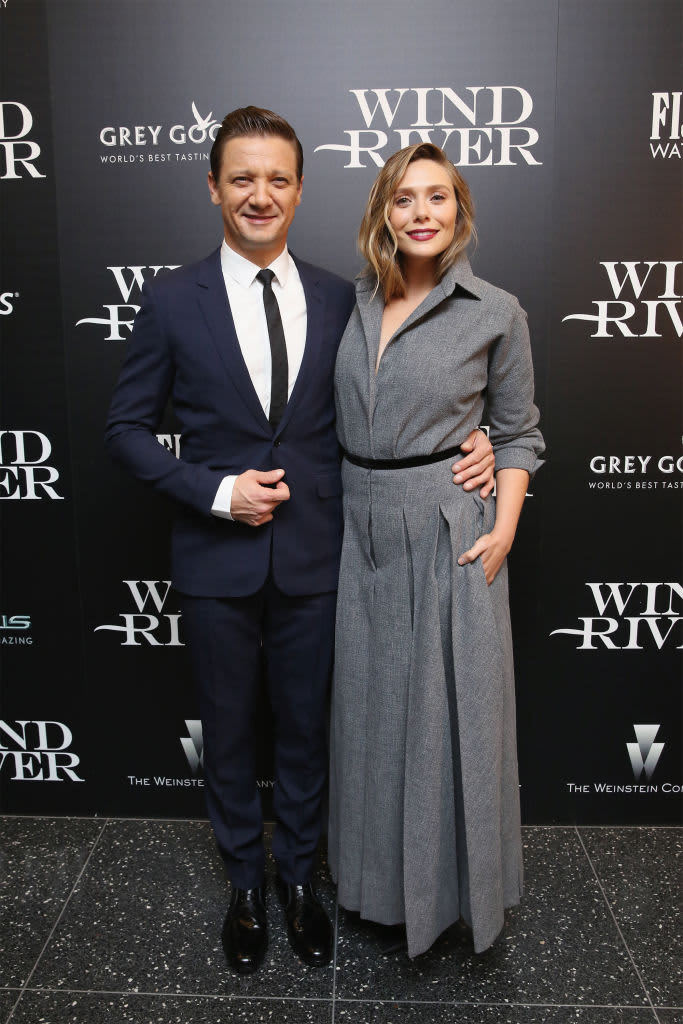 NEW YORK, NY - AUGUST 02:  Actors Jeremy Renner and Elizabeth Olsen attend The Weinstein Company with FIJI, Grey Goose, Lexus and NetJets screening of "Wind River" at The Museum of Modern Art on August 2, 2017 in New York City.  (Photo by Mireya Acierto/FilmMagic)