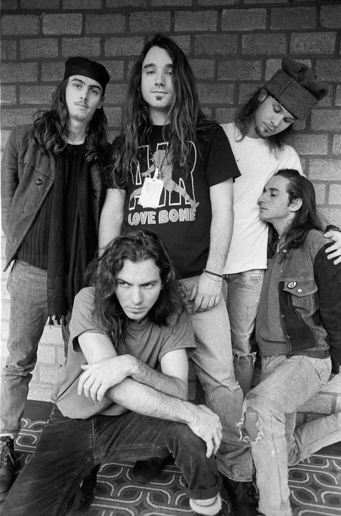 AMSTERDAM, NETHERLANDS - 14th FEBRUARY: American rock band Pearl Jam posed in Amsterdam, Netherlands on 14th February 1992. Left to right: guitarist Stone Gossard, (bottom) vocalist Eddie Vedder, drummer Dave Abbruzzese, bassist Jeff Ament and guitarist Mike McCready.  (Photo by Paul Bergen/Redferns)