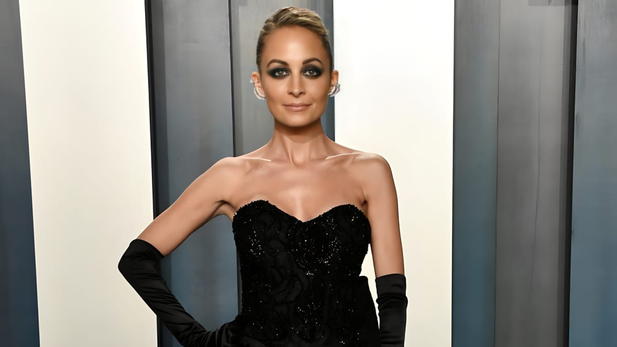 Nicole Richie smiling and posing.