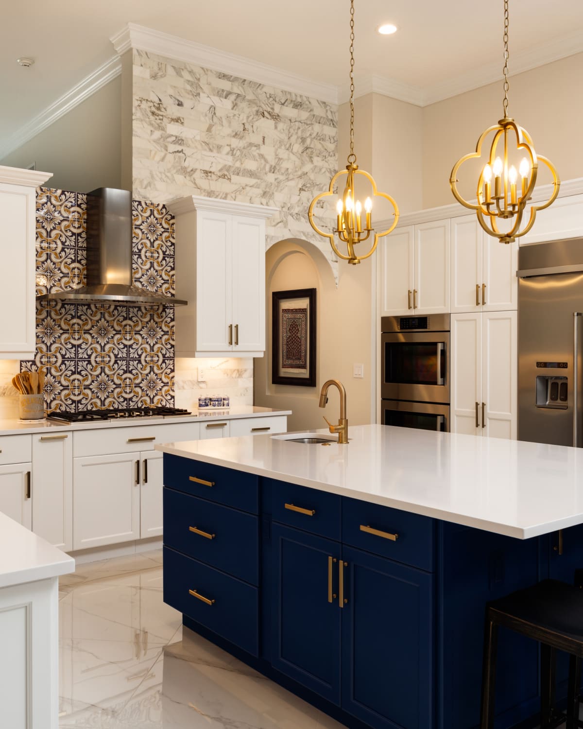 Beautiful luxury home kitchen with white cabinets