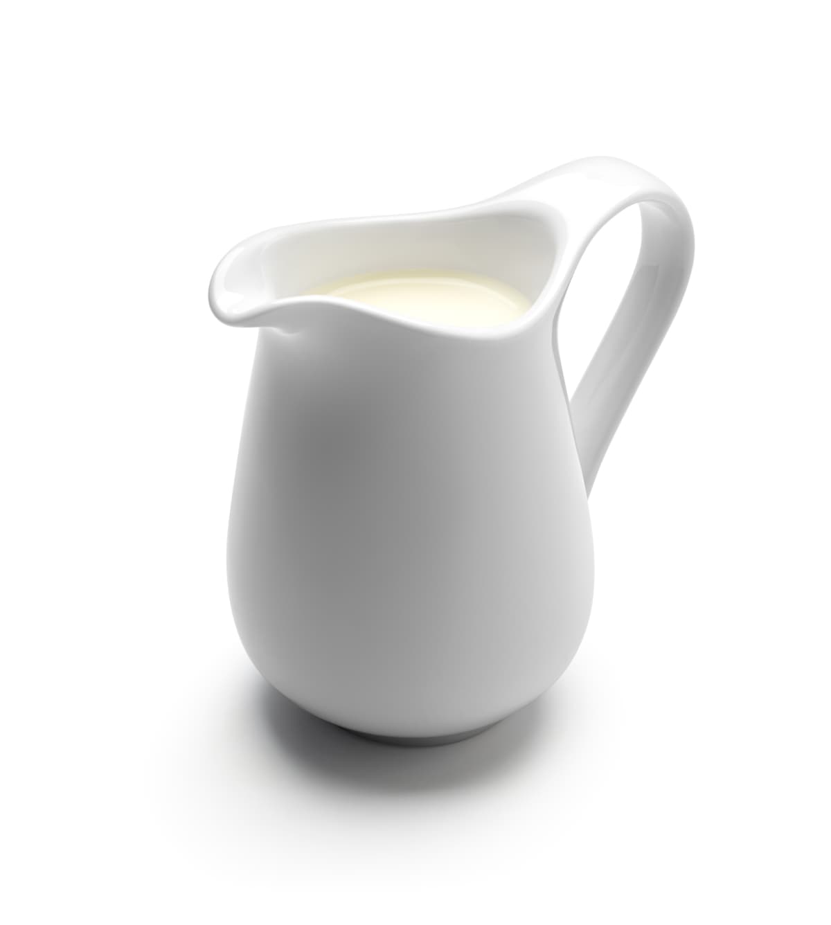 Milk in a white pitcher