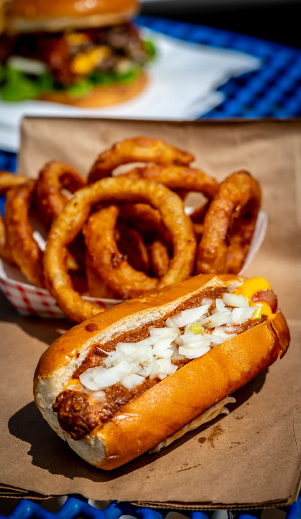 WASHINGTON, DC - April 11:  The Chili Cheese Dog with a side of onion rings at Spelunker's Frozen Custard and Burgers photographed for Casual Dining in Front Royal, VA on April 11, 2020. (Photo by Laura Chase de Formigny for The Washington Post via Getty Images)