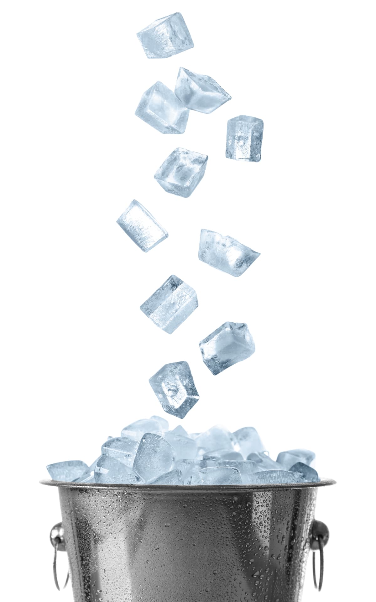 Ice cubes falling into bucket on white background
