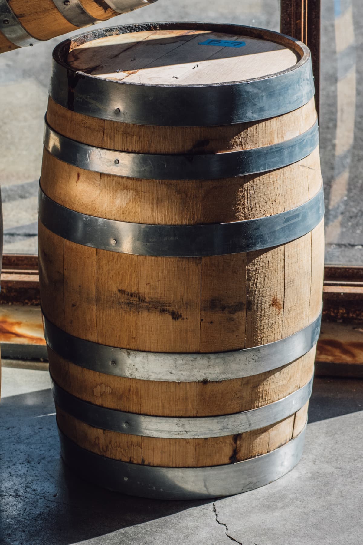 A vertical shot of a 15-gallon American oak whiskey bourbon barrel