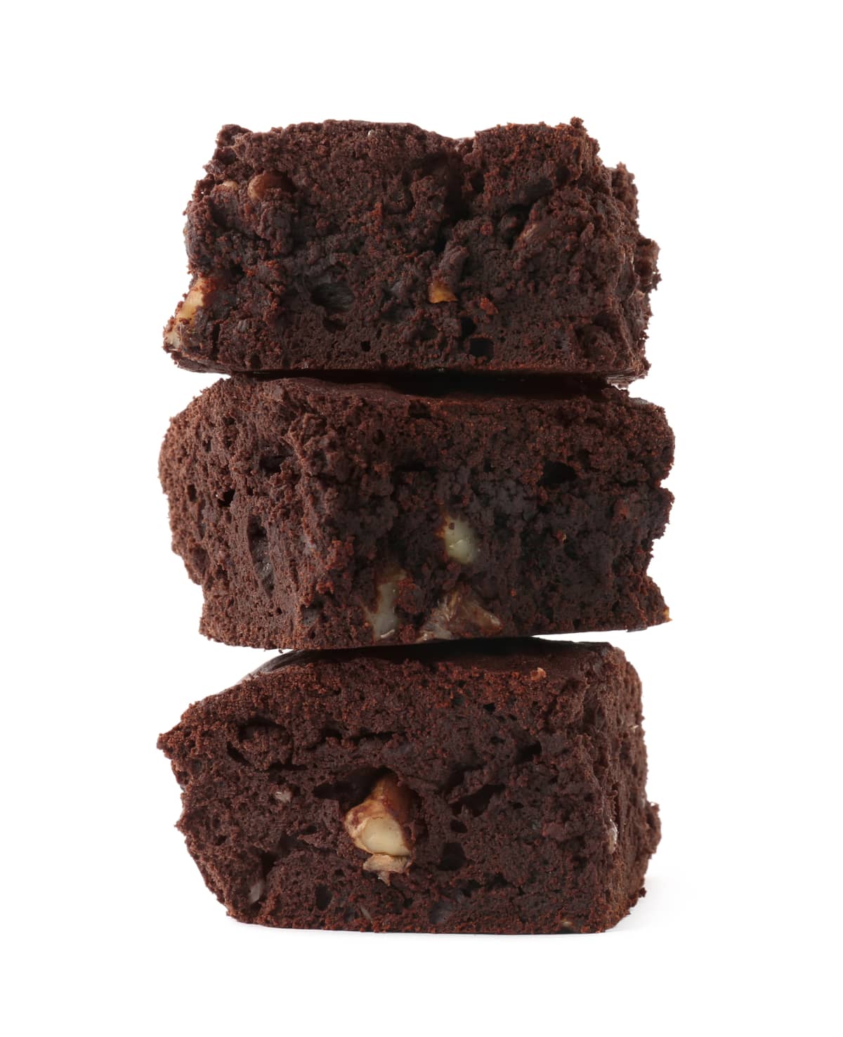 Delicious brownies with nuts on white background