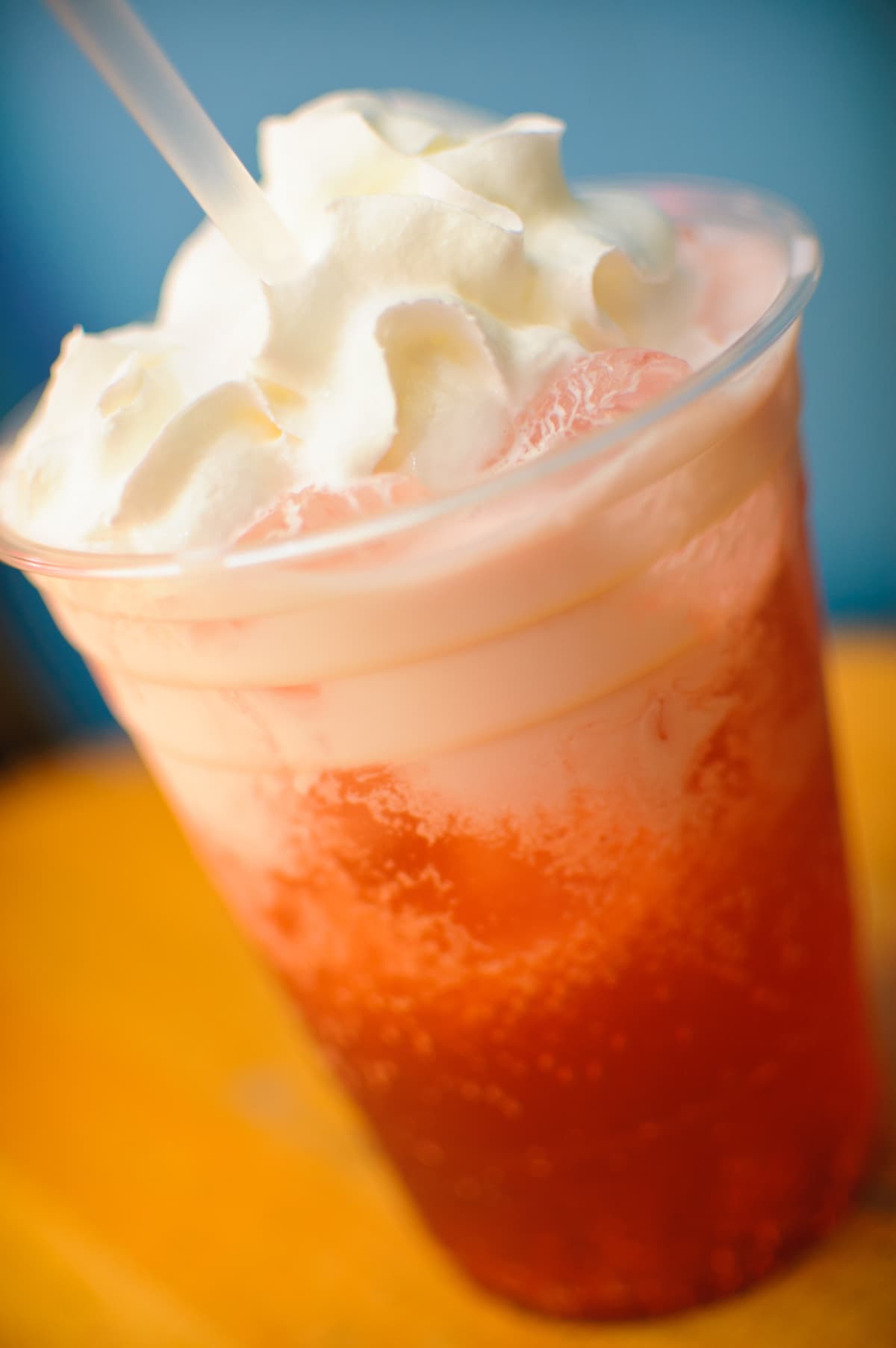 Iced Strawberry and Cherry Italian soda with whipped cream.