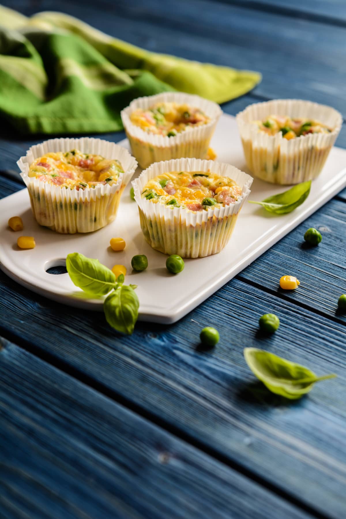 Baked mini frittatas with ham, pea, cheese and corn