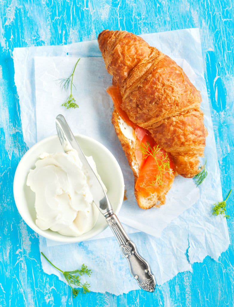 Croissant with tomato, basil and cream cheese. (Photo by: Anjelika Gretskaia/REDA&CO/Universal Images Group via Getty Images)