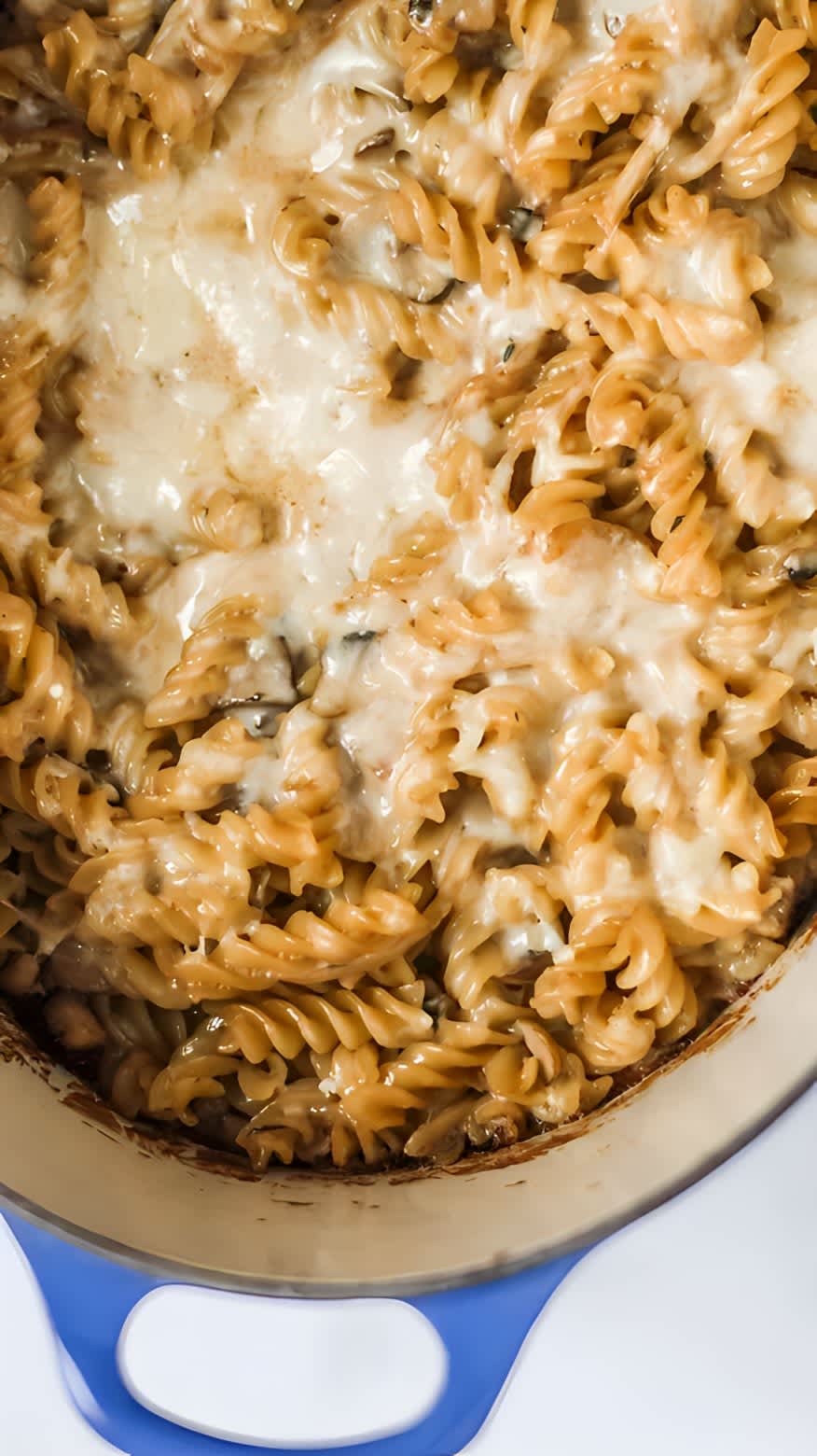 French onion pasta bake in blue pot