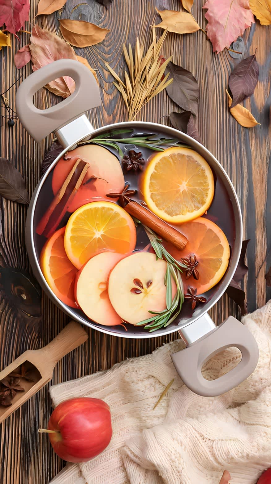 Simmer pot with oranges, apples, and cinnamon