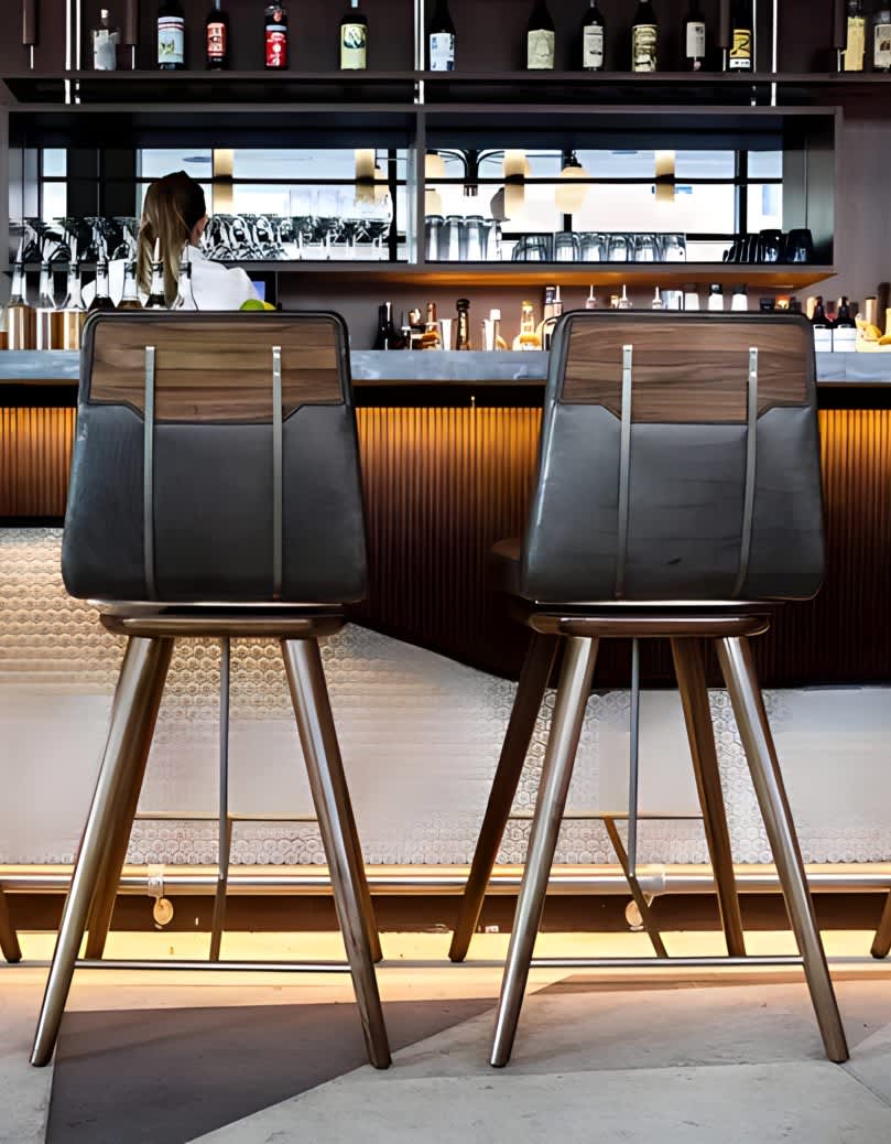 Bar with high black chairs
