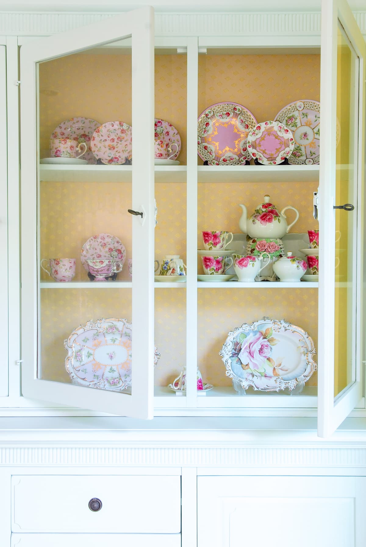 Colorful bowls on a vintage kitchen shelf