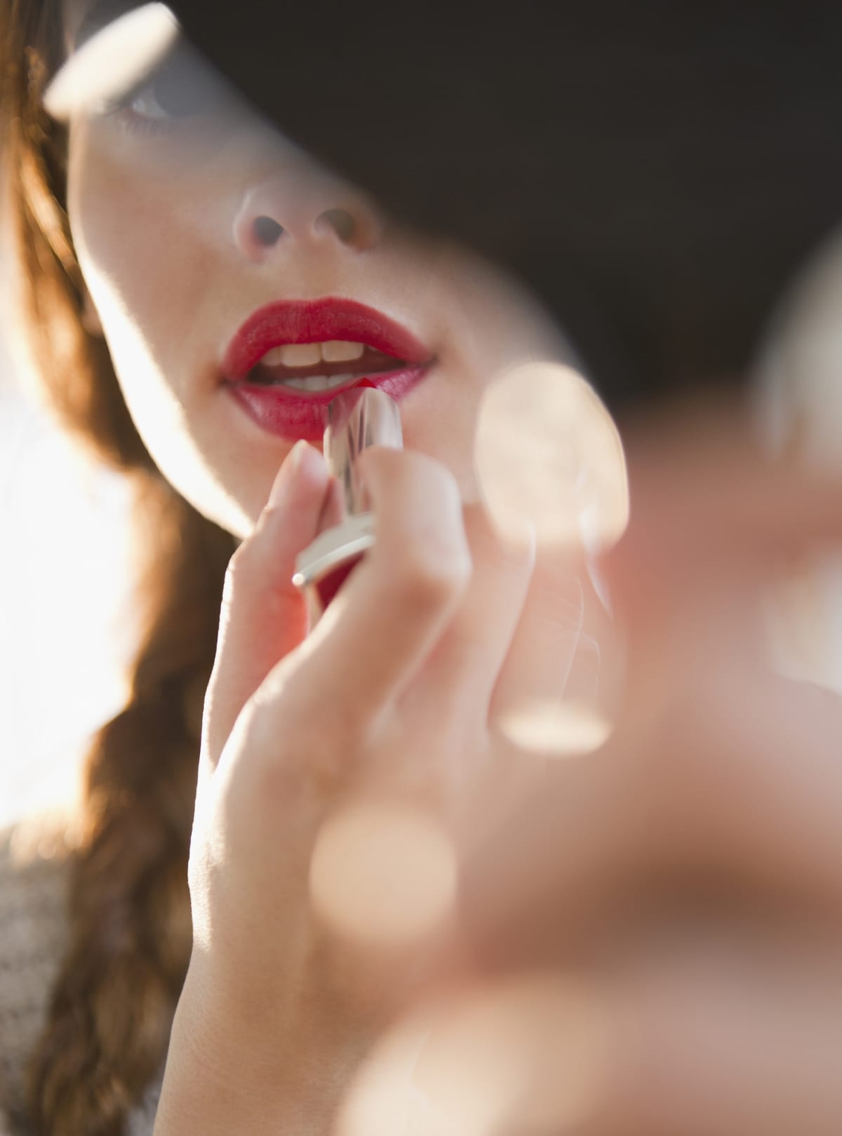 a woman wearing red lipstick