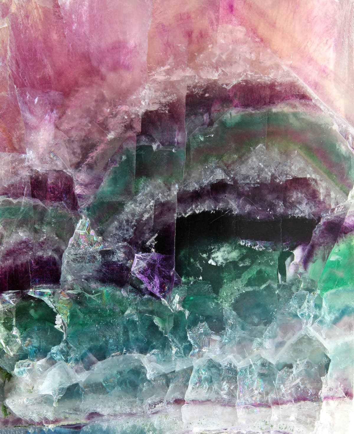 Pattern of a sparkling stone of fluorite poured by different colors