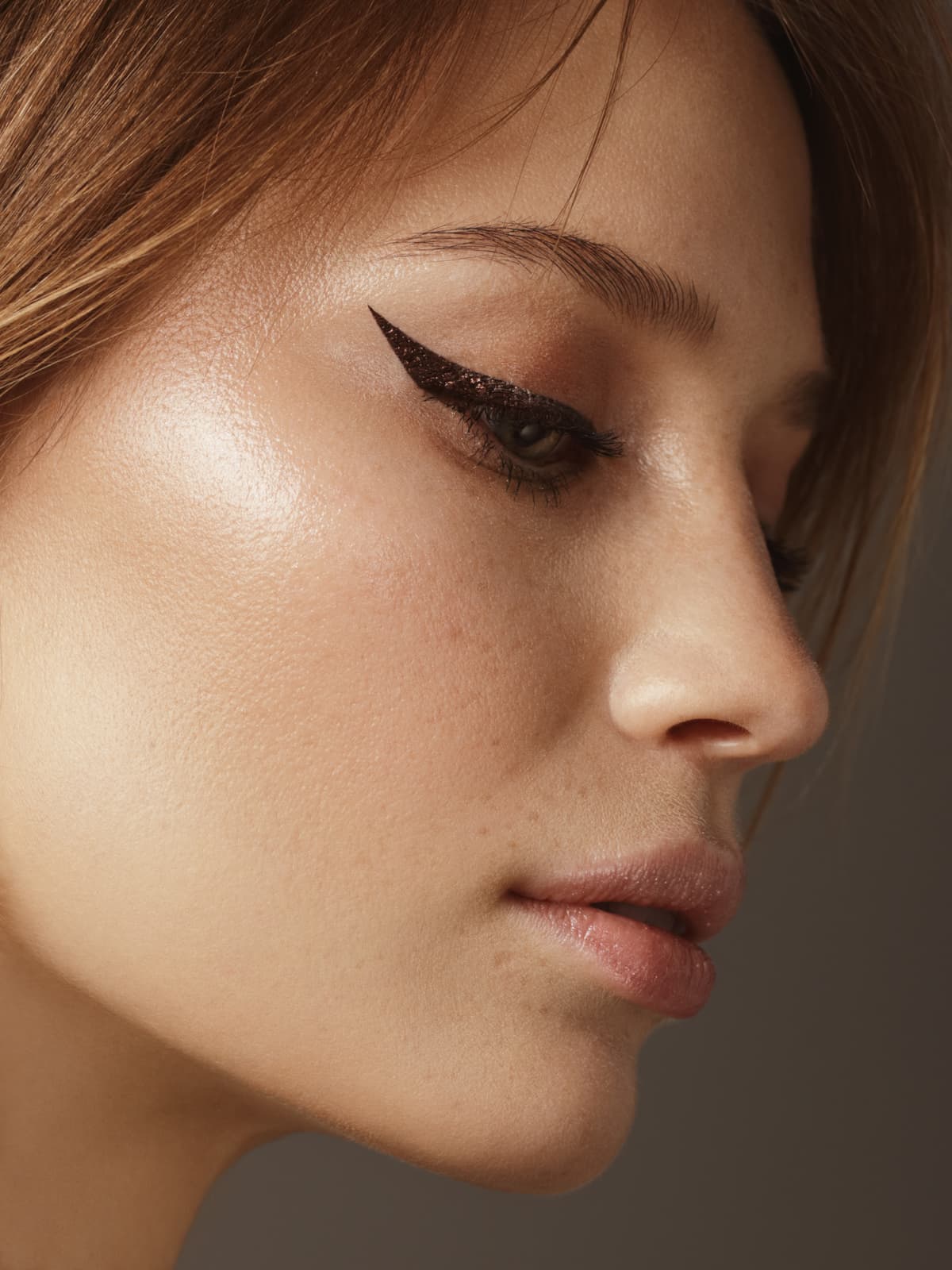 Close-up portrait of beautiful woman with cat eye eyeliner