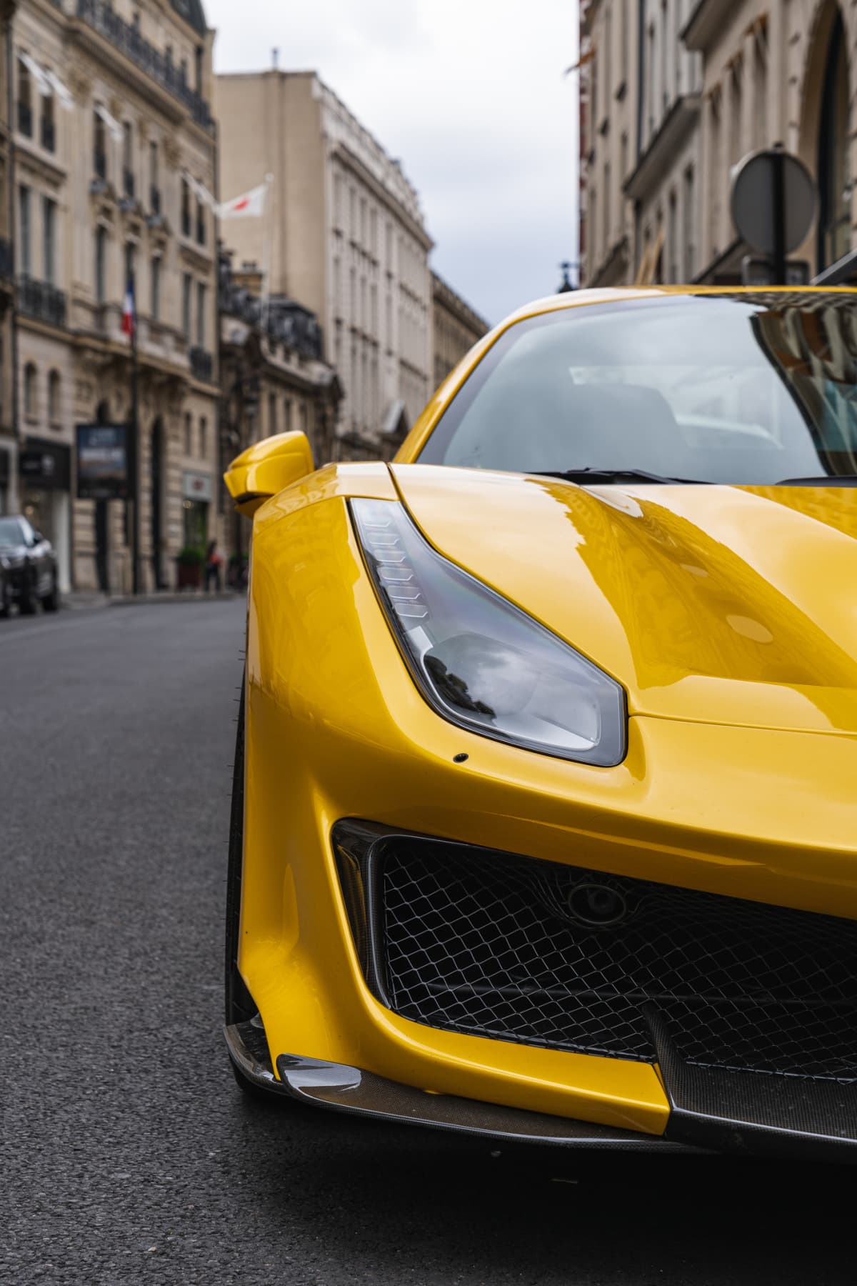 Paris, France - 06-05-2021: This Image shows a yellow Ferrari in Paris.