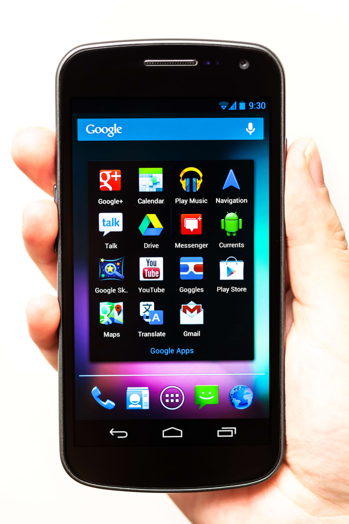 "Florence, Italy - August 19, 2012:  An hand holding the Galaxy Nexus smartphone on white background showing the homescreen with the Google applications. Made by Google and Samsung it mounts the operating system Android 4.1 (called Jelly Bean)."