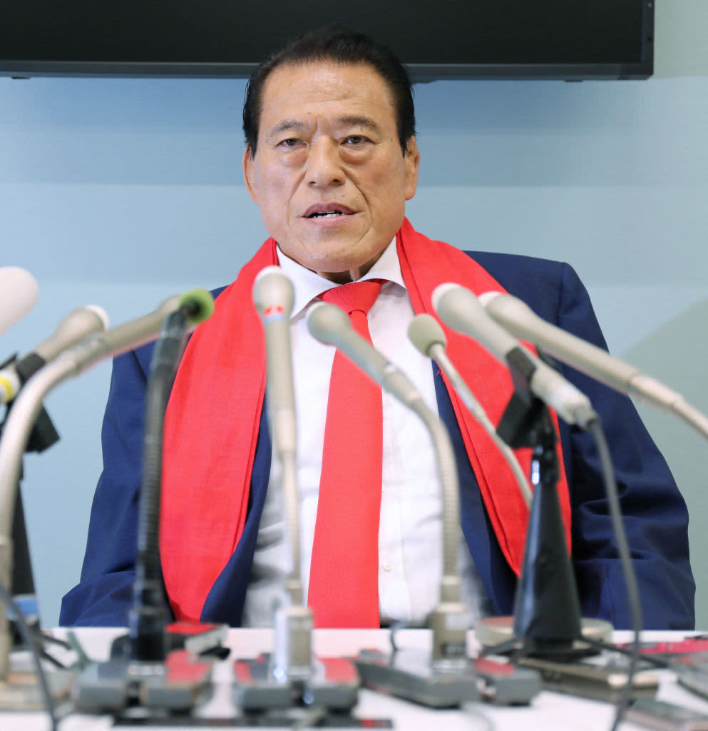 Former Japanese professional wrestler and a Japanese parliament member Antonio Inoki -- real name Kanji Inoki -- speaks to reporters as he returns from North Korea at the Tokyo international airport on January 16, 2014. Inoki visited Pyongyang and he had talks with Kim Yong Il, secretary of the Central Committee of the Workers' Party of Korea and an advisor to the North Korea-Japan Friendship Association in Pyongyang.   AFP PHOTO / Yoshikazu TSUNO        (Photo credit should read YOSHIKAZU TSUNO/AFP via Getty Images)