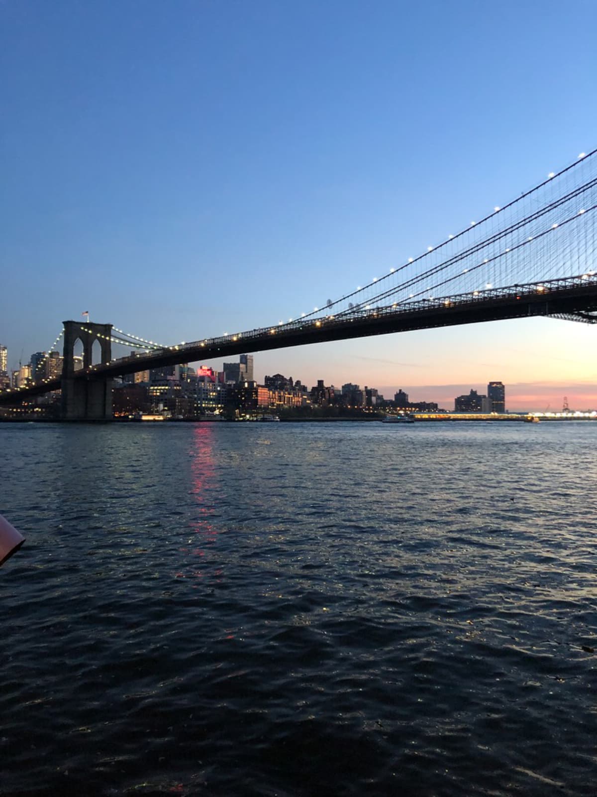 Brooklyn Bridge at sunset viewed from Brooklyn Bridge park