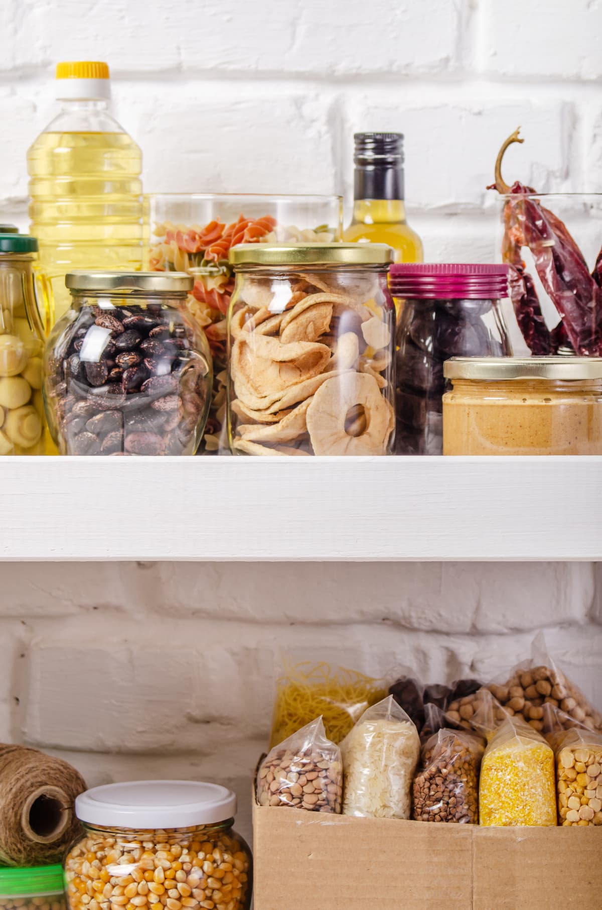 Non-perishable foods on pantry shelves