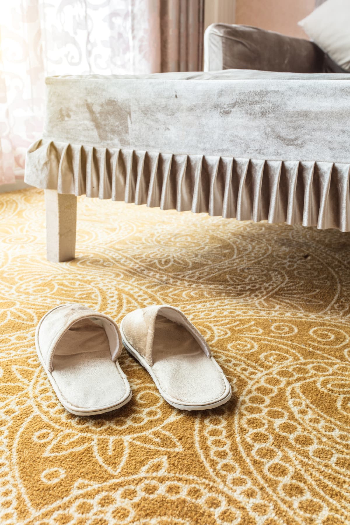 Cotton slippers on carpet